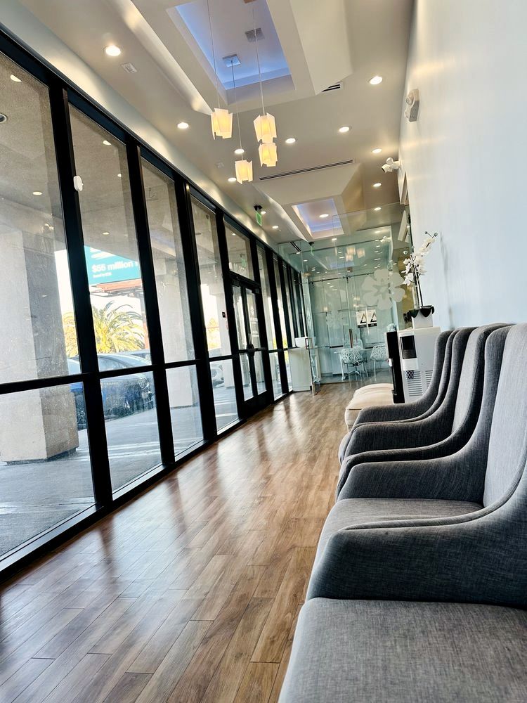 The corridor at Autumn Smile Dental with pendant lights
